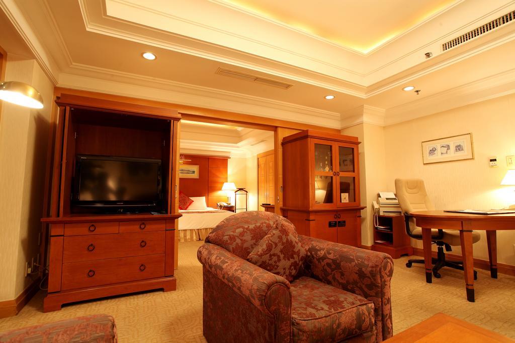 Ruishi Hotel Dalian Habitación foto