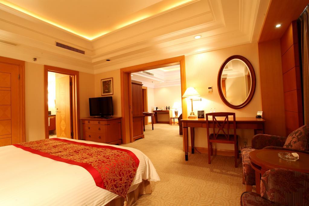 Ruishi Hotel Dalian Habitación foto